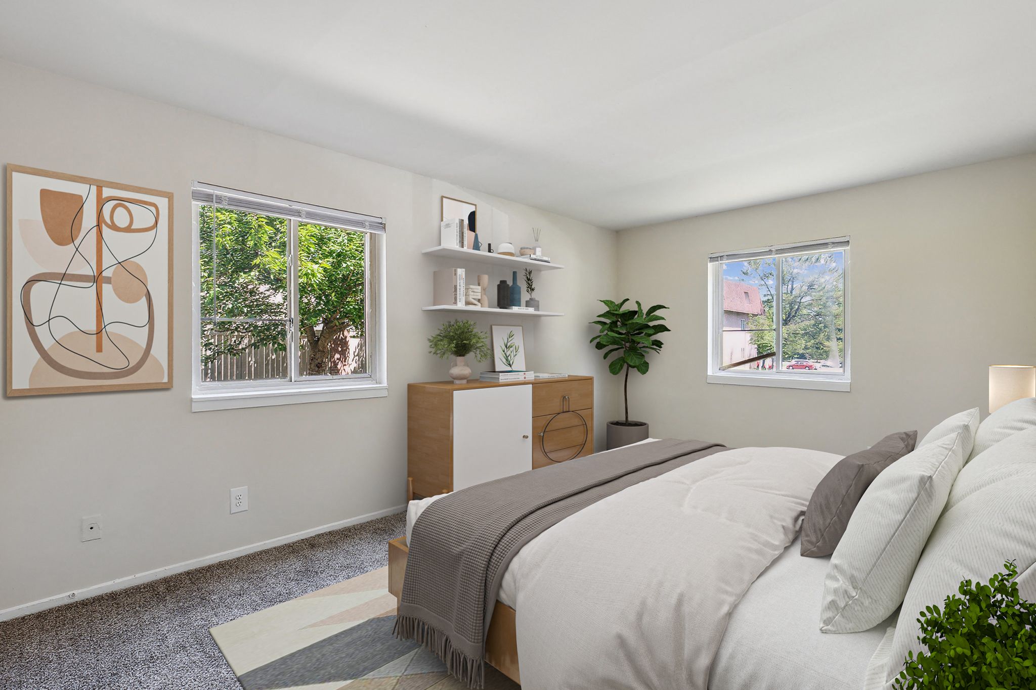 a bedroom with a bed and two windows